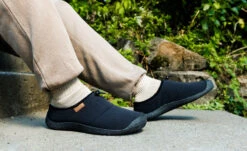 Keen Men's Howser III Slide | Black/Black Recycled -Fresh Shoes Shop 1029441 desktop lifestyle 01 5dbbcb2f 4271 4333 84d2 bc062c41702f